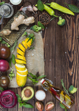  Top view of organic natural fresh vegetables on wooden background with copy space