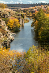 Terrific view of the River Canyon on a sunny fall dayTerrific view of the River Canyon on a cloudy fall day. Buky Canyon on the Hirs'kyi Tikych river in Ukraine
