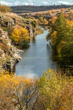 Terrific view of the River Canyon on a sunny fall dayTerrific view of the River Canyon on a cloudy fall day. Buky Canyon on the Hirs'kyi Tikych river in Ukraine