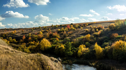 Terrific view of the River Canyon on a sunny fall dayTerrific view of the River Canyon on a cloudy fall day. Buky Canyon on the Hirs'kyi Tikych river in Ukraine.