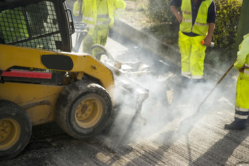 highway maintenance workers in construction site