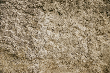 Beige granite rock background texture