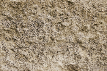 Beige granite rock background texture