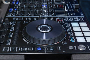 DJ console cd mp4 deejay mixing desk music party in nightclub. DJ console for experiments with music