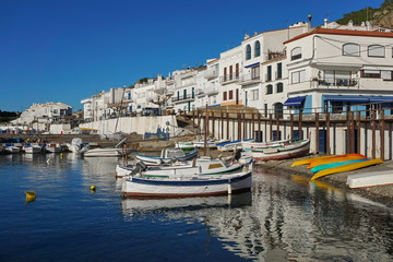 Fototapeta na wymiar Spain Catalonia Mediterranean village El Port de la Selva with boats on the sea shore, Costa Brava, Alt Emporda