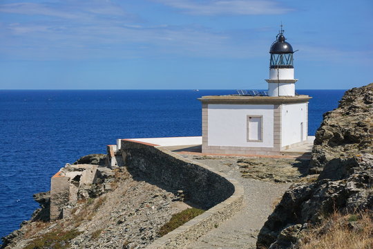 Spain Cadaques Cala Nans lighthouse on the Mediterranean sea shore, Costa Brava, Cap de Creus, Alt Emporda, Catalonia