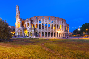 Colosseum or Coliseum during blue hour, also known as the Flavian Amphitheatre, the largest...