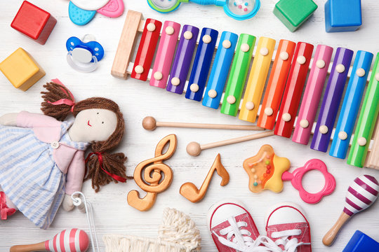 Beautiful composition with xylophone on wooden background. Baby songs concept