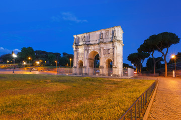 The Arch of Titus during blue hour, in the centre of the old city of Rome, Italy.