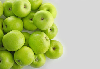 Fresh green apples on white background