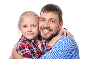 Cute little girl with her father on white background