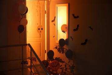 Doorway decorated with balloons for Halloween celebration