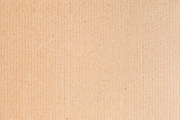 Fototapeta premium The brown paper box is empty, the corrugated surface of the abstract background.