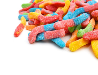 Gummy worm candies on white background