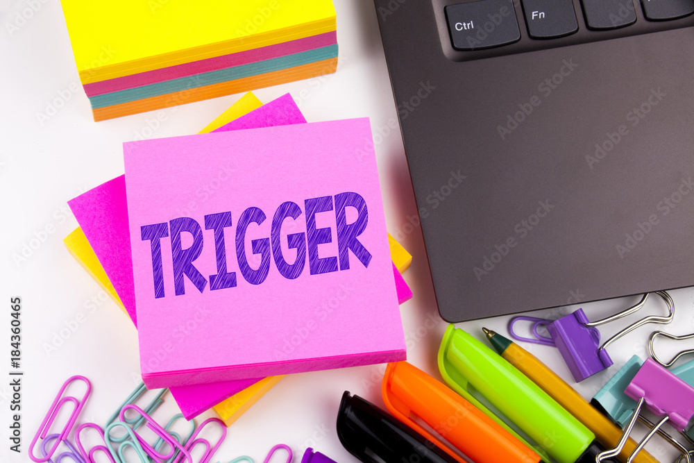 Fototapete writing text showing trigger made in the office with surroundings such as laptop, marker, pen. busin