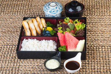 japanese cuisine. lunch box set on the background