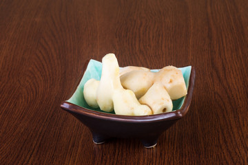 Ginger or fresh ginger on a background.