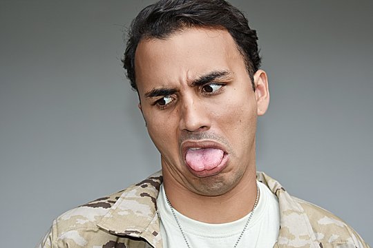 Enlisted Male Soldier Making Funny Faces