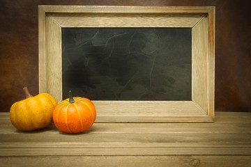 Pumpkins with Empty Chalk Board