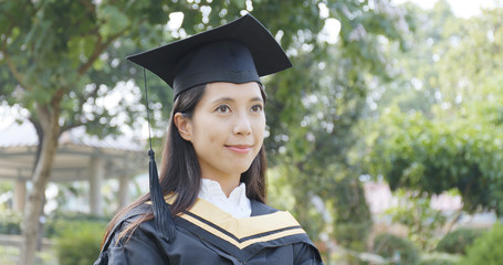 Asian woman graduation and smile to camera