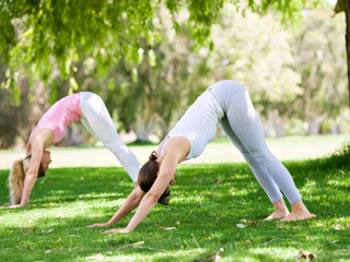 Fototapeta premium Young women exercising in the park