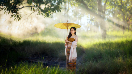 Asian woman wearing Thai Chiang Mai style dress or North Thailand.