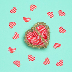 Small heart-shaped basket with textile hearts