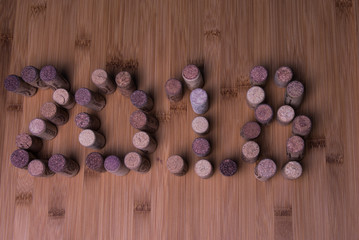 New year 2018 number made of wine corks isolated on wooden
