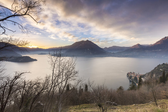 Italy, Lombardy, the sunset of Como lake, at bottom right Varenna village.