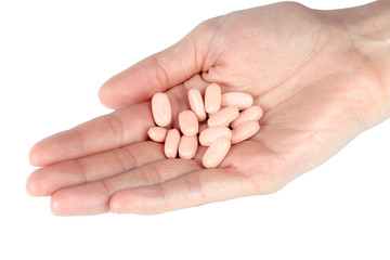 pills in woman hand