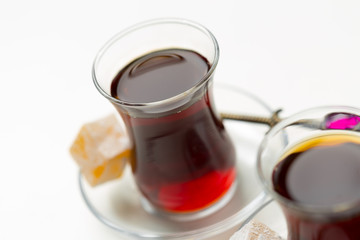 Turkish tea in traditional glass isolated on white background