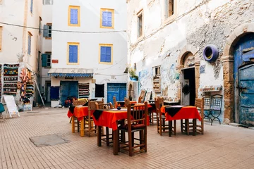 Outdoor-Kissen colorful furniture at Essaouira old medina, morocco © jon_chica