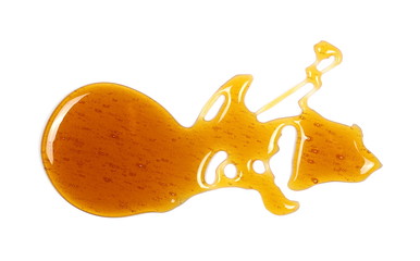 Honey isolated on white background, top view