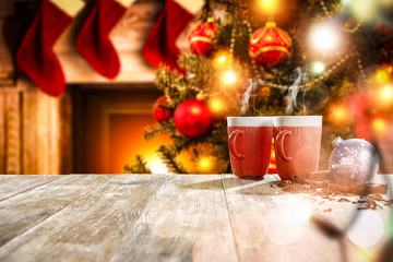 desk of free space and christmas mug with hot drink 