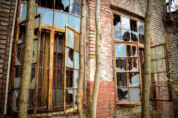 A broken window on a lost place factory