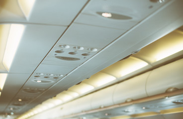Interior inside of the plane with passengers.