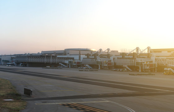 Airport terminal docks at morning sunrise.