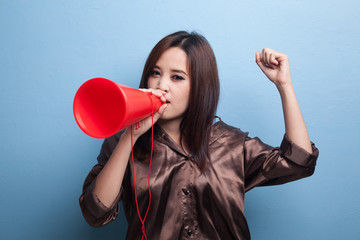 Beautiful young Asian woman announce with megaphone.