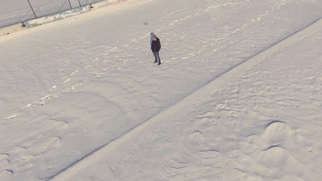 Aerial view of young guy at the snow