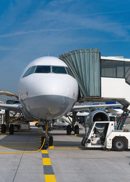 Passenger plane in the airport. Unboarding.