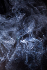 Smoke on a black background.