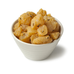 Traditional Slovak pieces of hand cheese with caraway seeds in a bowl