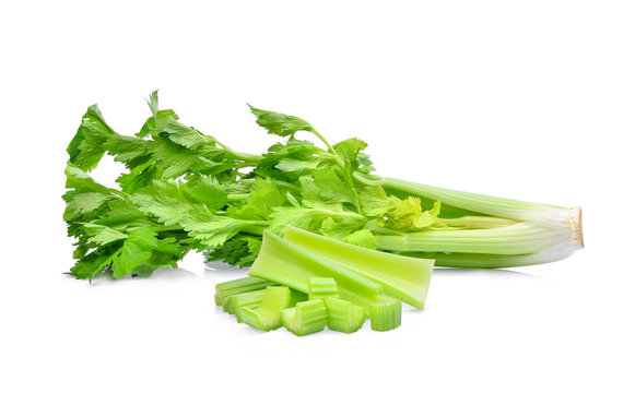 green celery vegetable with slice isolated on white background