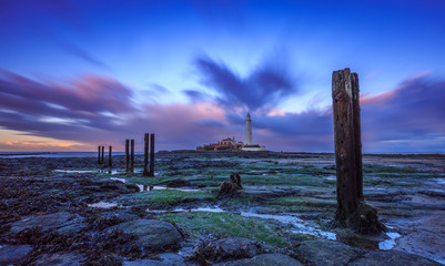 Long exposure of twilight sky surrounding St.Mary's Lighthouse, Northumberland, England