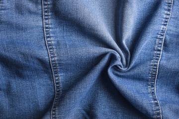 Naklejka premium Blauer Jeansstoff mit Nähten