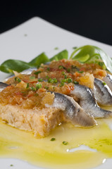 Pastel de pescado con boquerones