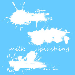 Set of white milk splashes and splatters