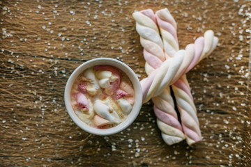 Coffee with marshmallow in a light blue cup