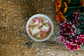 Coffee with marshmallow in a light blue cup