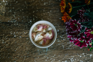 Coffee with marshmallow in a light blue cup